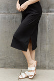 Ribbed Knit Sleeveless Midi Dress in Black